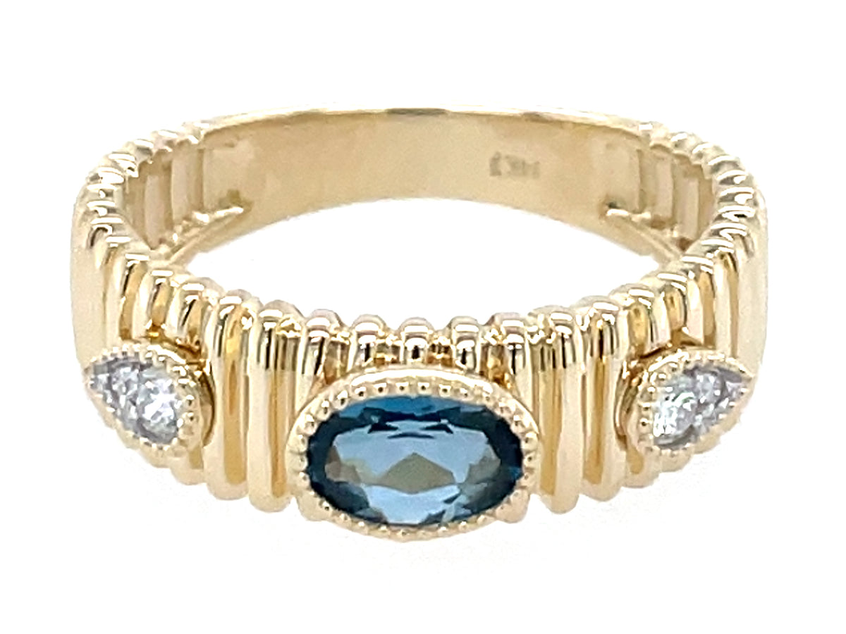 Blue Topaz Oval Center Diamond Ribbed Ring