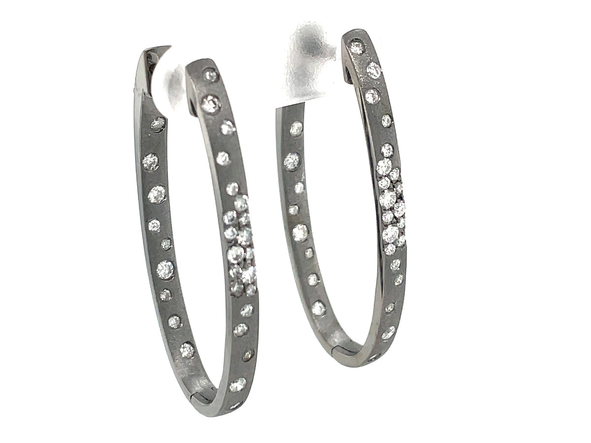 DIAMOND FLUSH SET OVAL HOOP EARRING