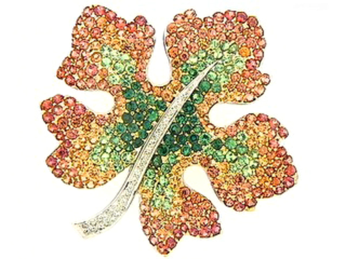 TSAVORITE, ORANGE SAPPHIRE & DIAMOND BROACH