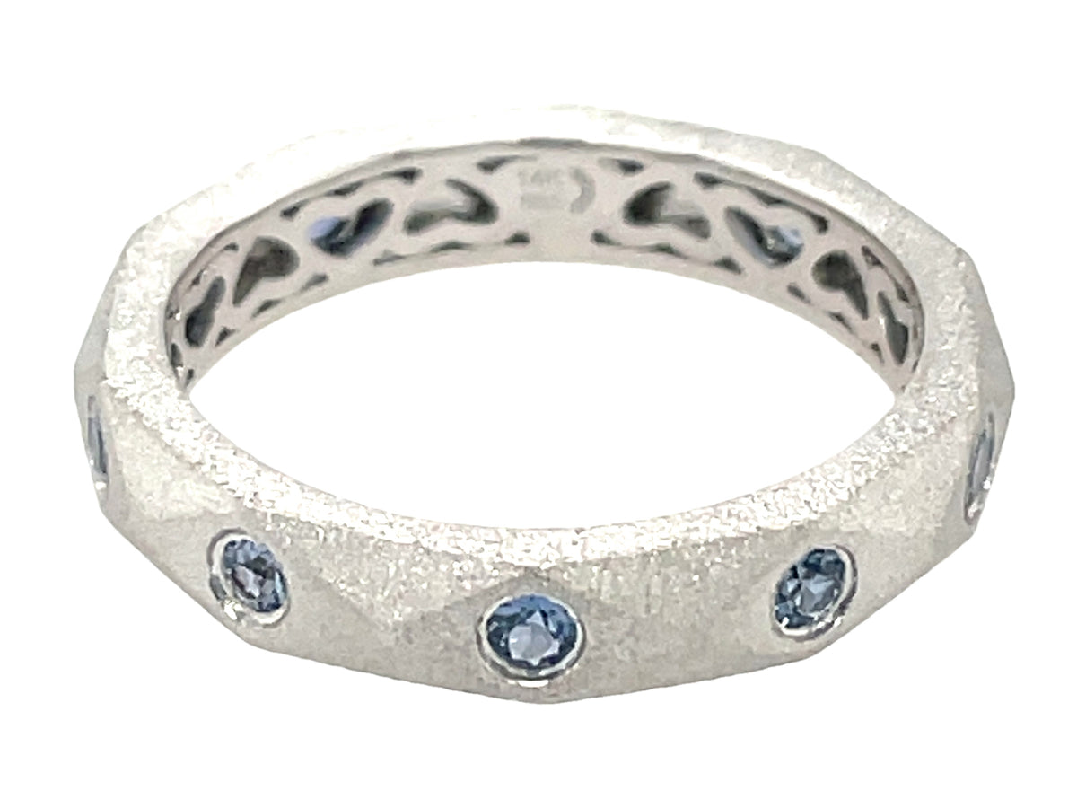 BLUE SAPPHIRE FACETED ETERNITY BAND, SATIN FINISH