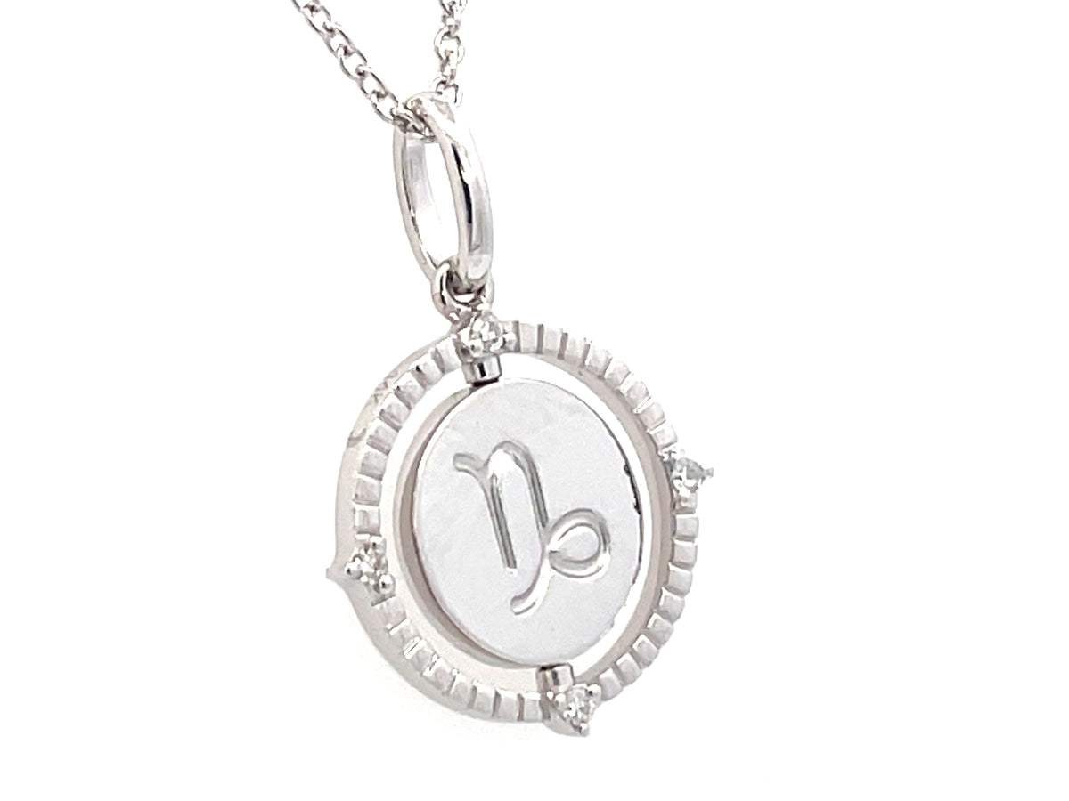 DIAMOND CAPRICORN DISC FLIP PENDANT