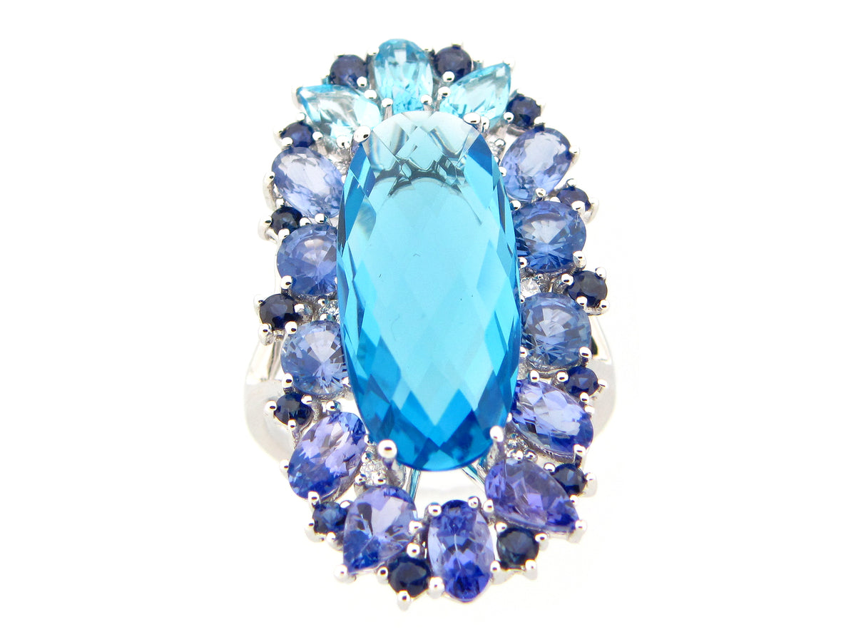 CHB OVAL SWISS BLUE TOPAZ, TANZANITE, SAPPH & DIAMOND RING, 14KW(H/R)