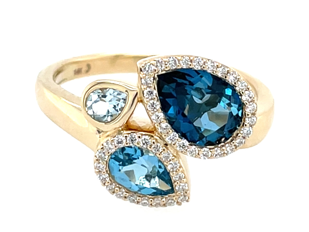 BLUE TOPAZ PEAR SHAPE 3 STONE & DIAMOND RING