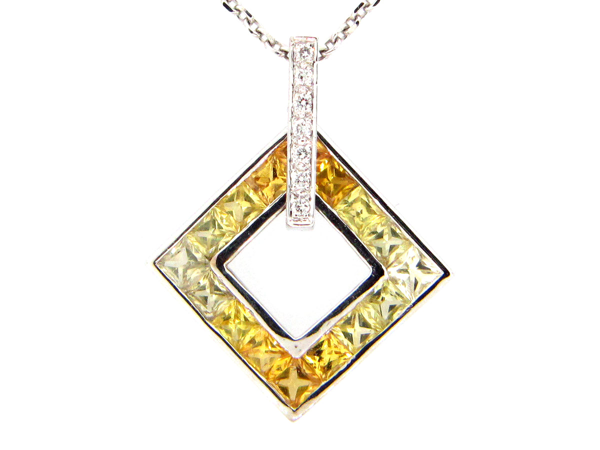 ORANGE SAPPHIRE & DIAMOND PENDANT, 18KW (H), C=1.58