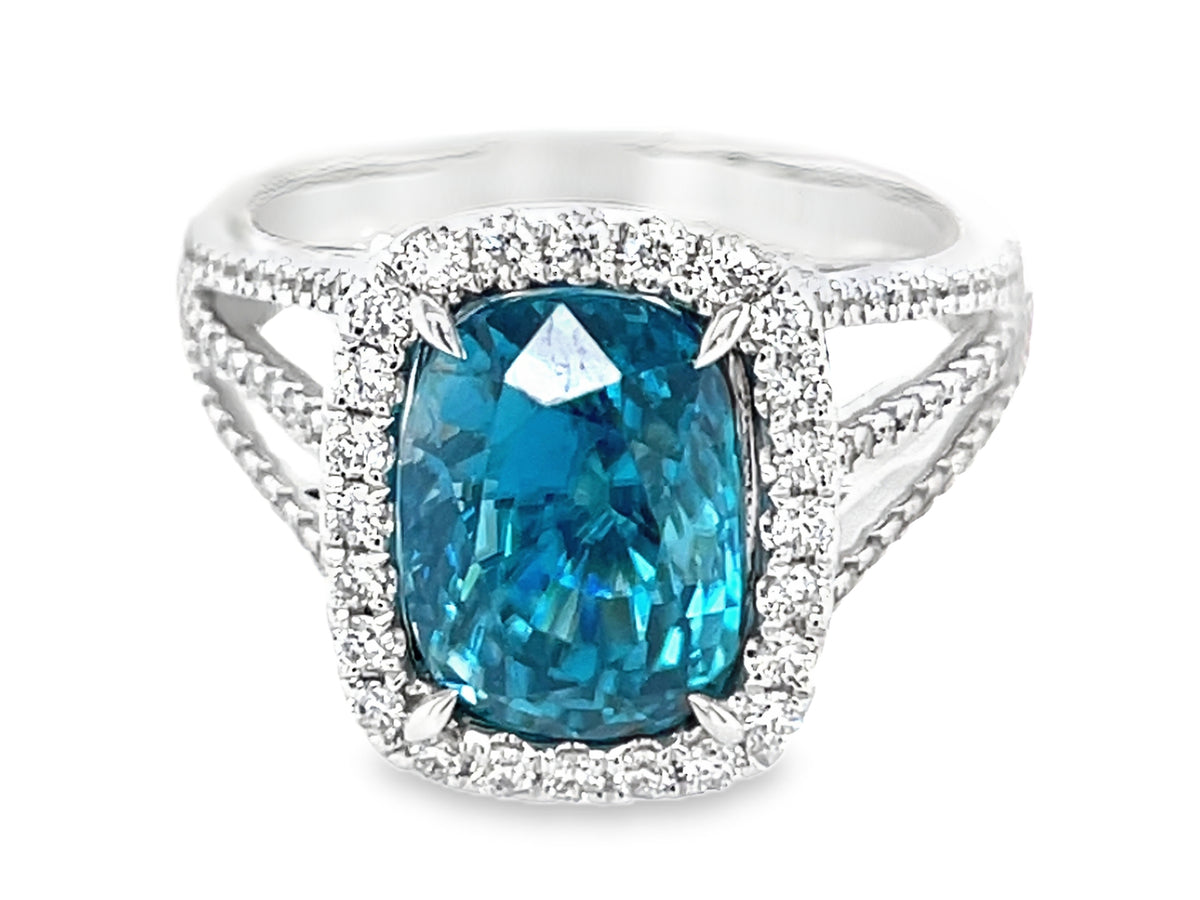 BLUE ZIRCON CUSHION & DIAMOND HALO 3 SHANK RING