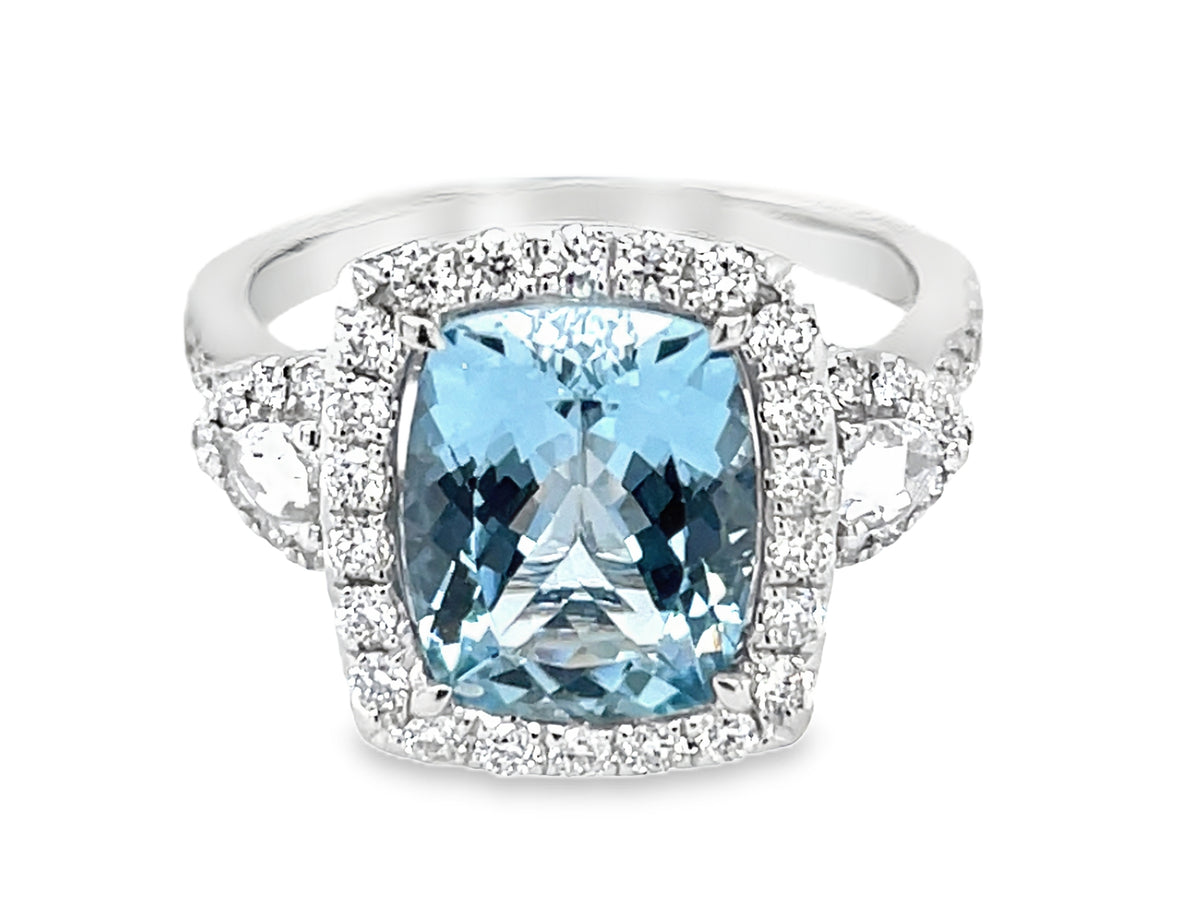 AQUAMARINE CUSHION & DIAMOND HALO 3 STONE RING