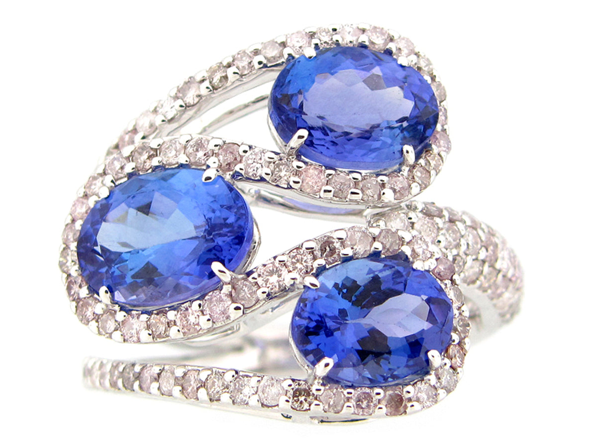 TANZANITE & DIAMOND RING, 18KW (H)