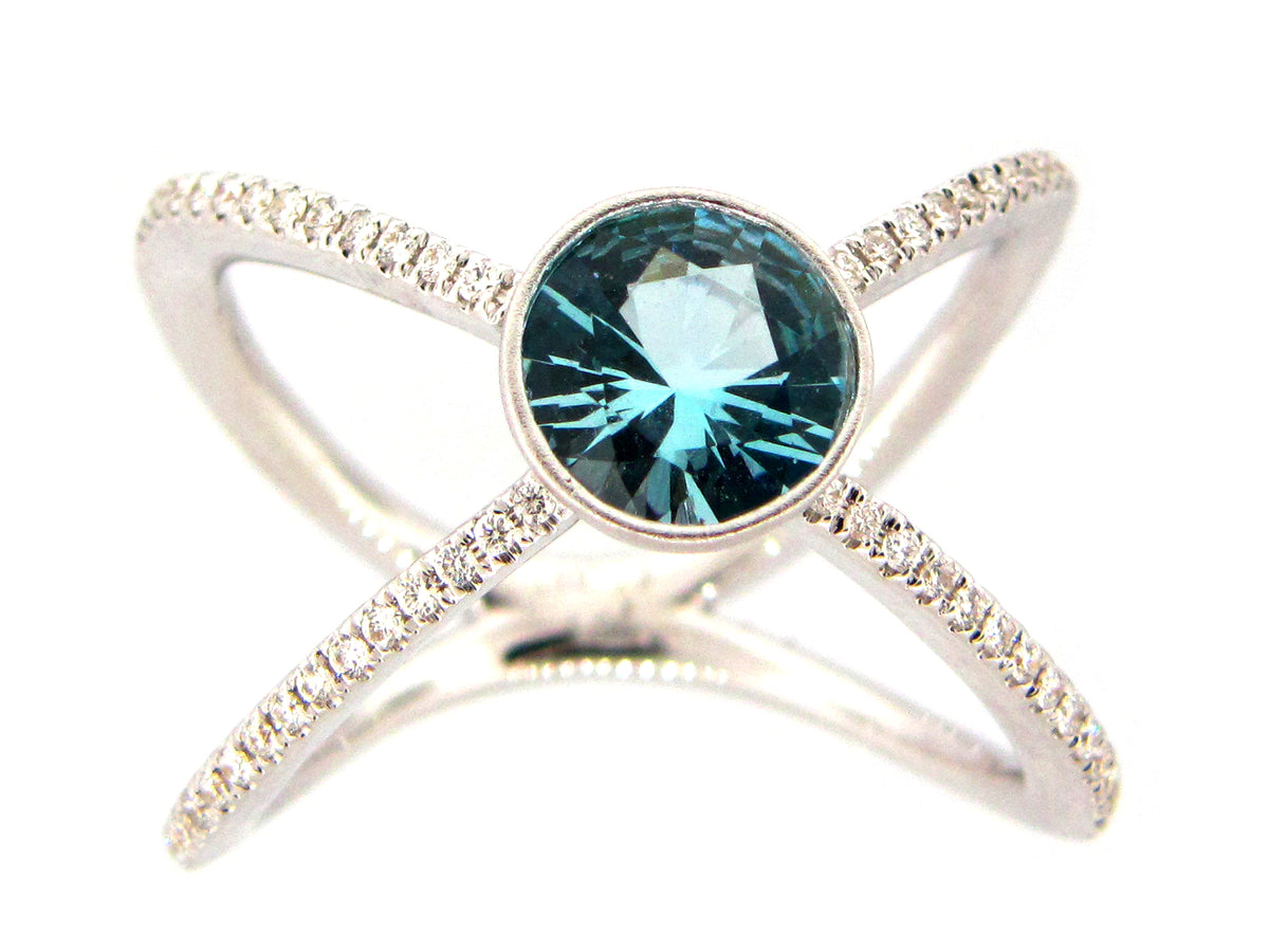 BLUE ZIRCON & DIAMOND X RING, 18KW (H)