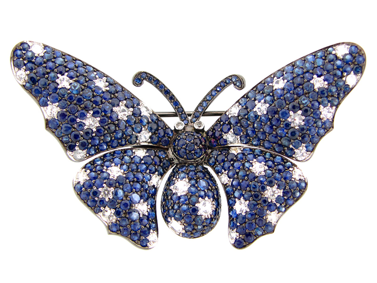 BLUE & WHITE SAPPHIRE BROOCH, BLACK FINISH, SILVER (H)