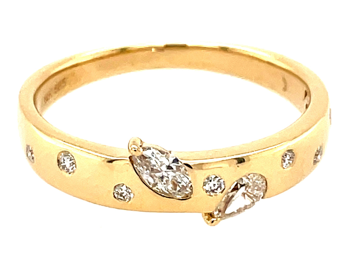 DIAMOND PEAR, MARQUISE & ROUNDS LEAF MOTIF RING