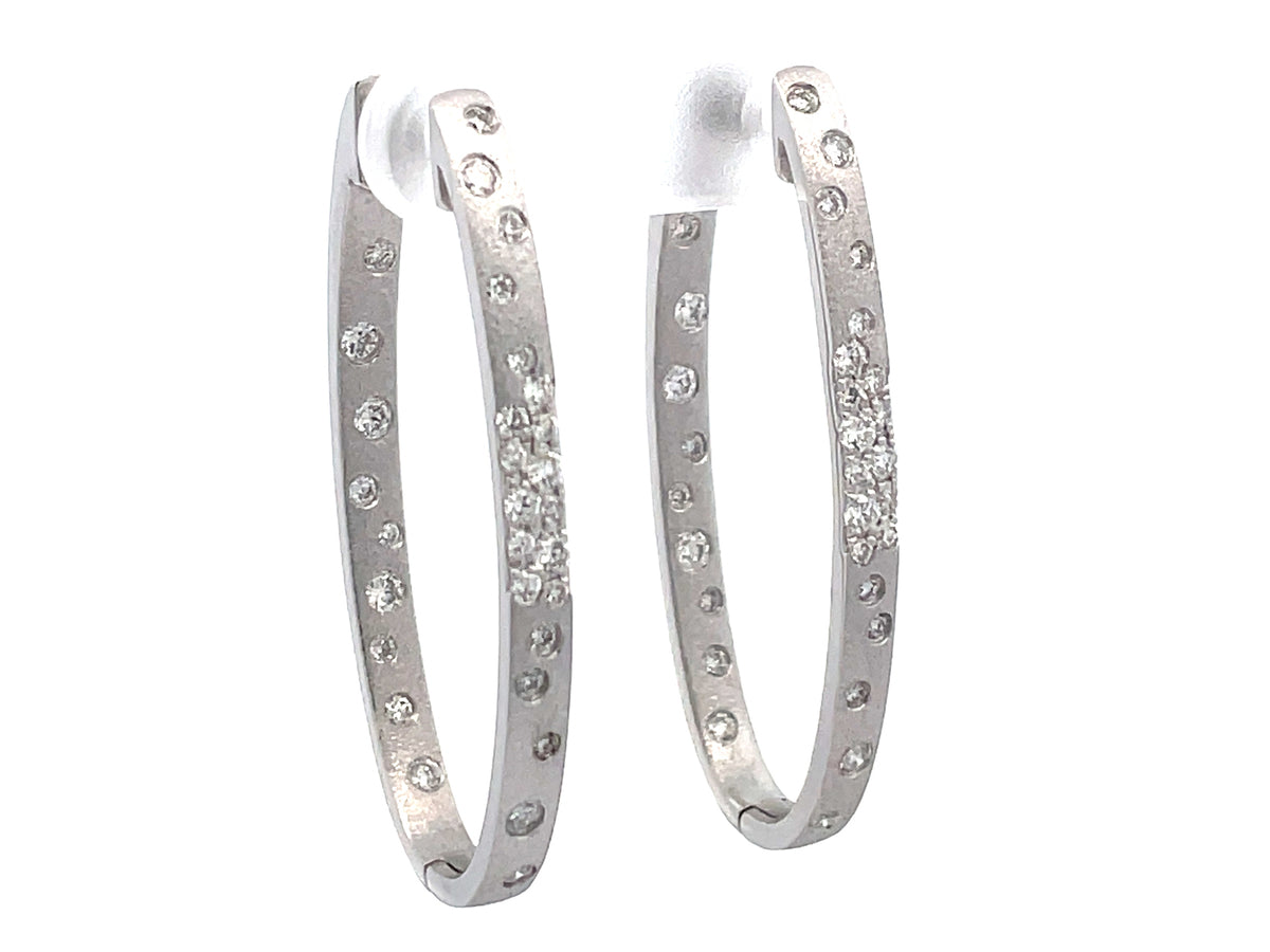 DIAMOND FLUSH SET OVAL HOOP EARRING