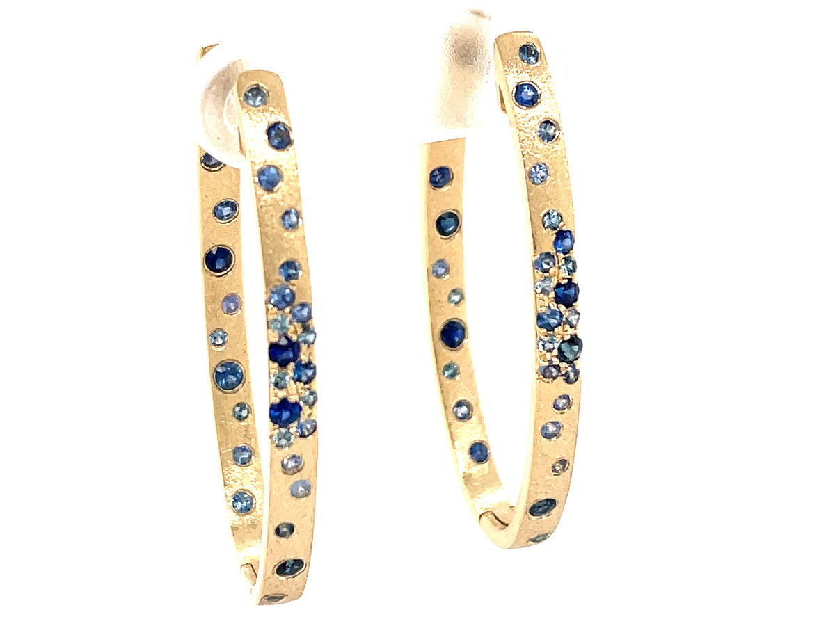 SAPPHIRE FLUSH SET OVAL HOOP EARRING