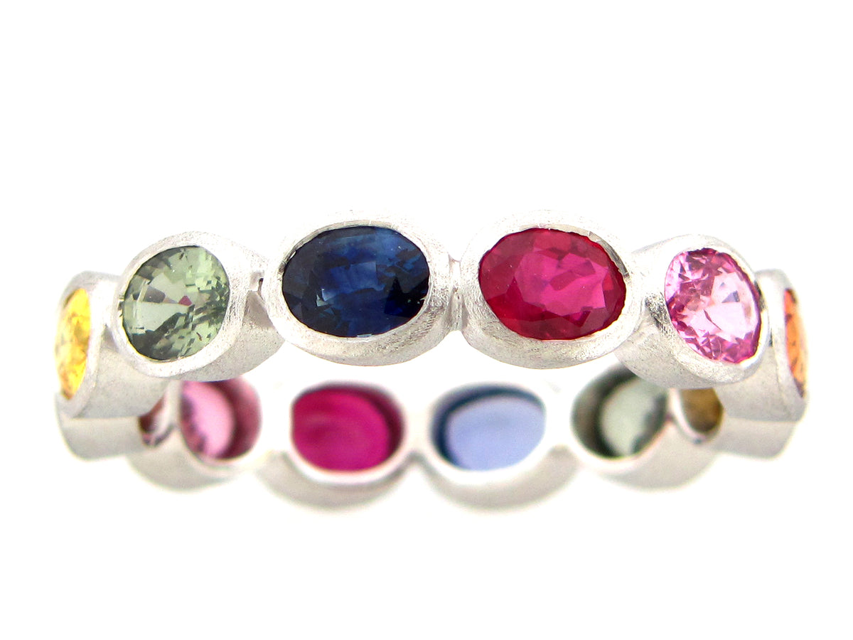 RAINBOW SAPPHIRE OVAL BEZEL SATIN ETERNITY BAND, 14KW, SIZE 10 ( H/U)