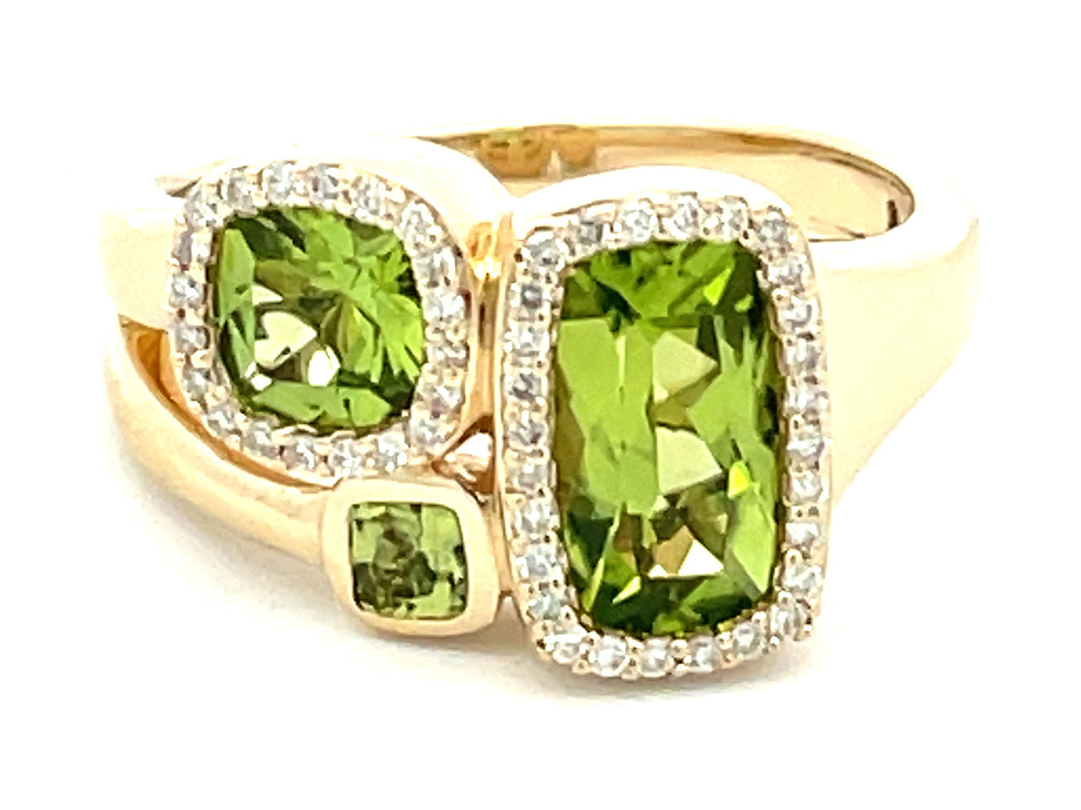 PERIDOT CUSHION 3 STONE & DIAMOND RING