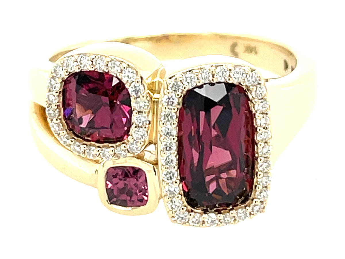 RHODOLITE CUSHION 3 STONE & DIAMOND RING