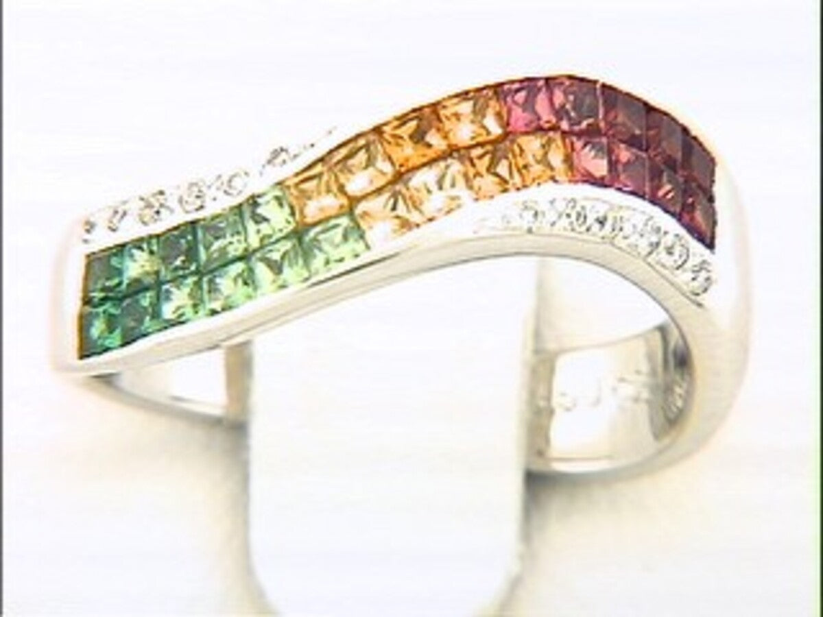 TSAVORITE, ORANGE SAPPHIRE & DIAMOND RING
