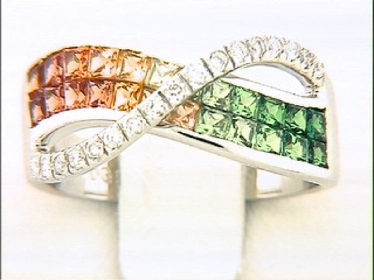TSAVORITE, ORANGE SAPPHIRE & DIAMOND RING