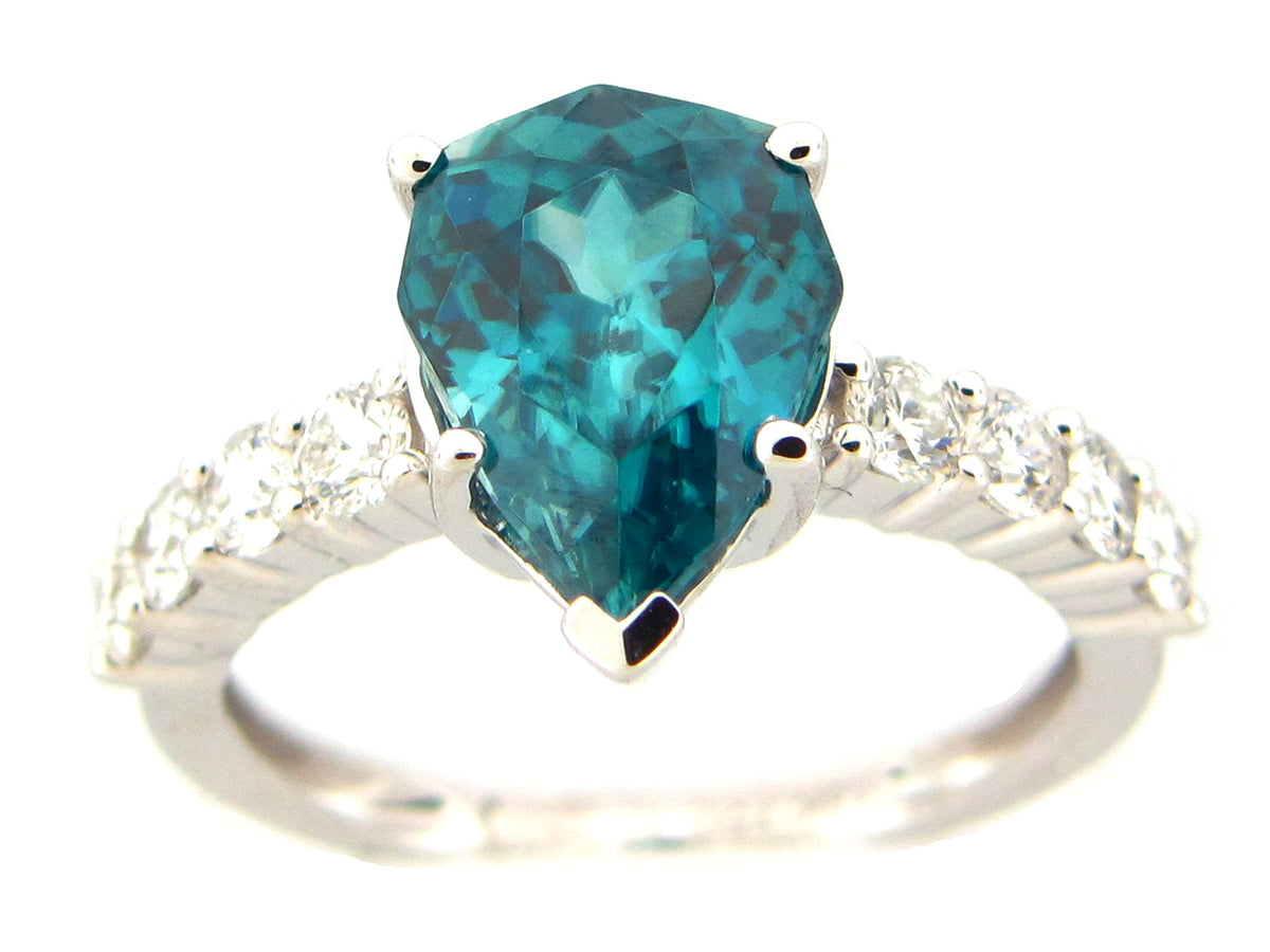 BLUE ZIRCON & DIAMOND PEAR RING, 18KW (H)