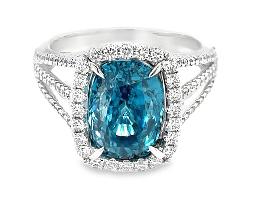 BLUE ZIRCON CUSHION & DIAMOND HALO 3 SHANK RING