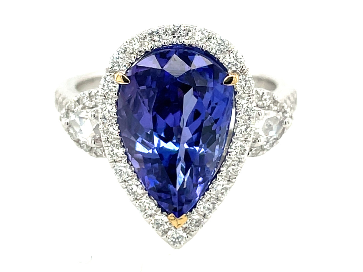 TANZANITE PEAR & DIAMOND HALO 3 STONE RING