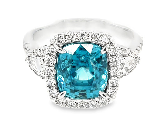 BLUE ZIRCON CUSHION & DIAMOND HALO 3 STONE RING, 18KW (H)