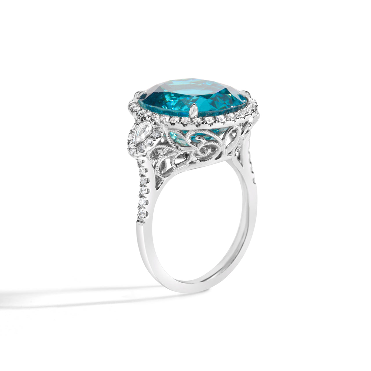 Oval Blue Zircon & Diamond 3 Stone Ring