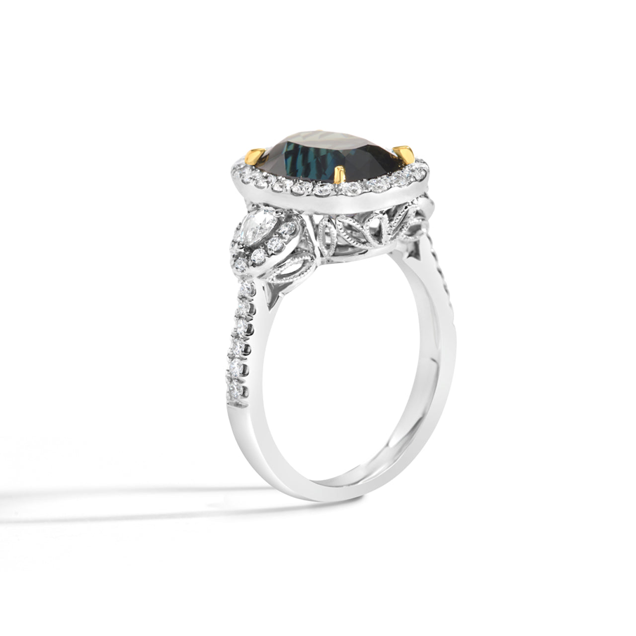 Oval Green Sapphire & Diamond Halo 3 Stone Ring