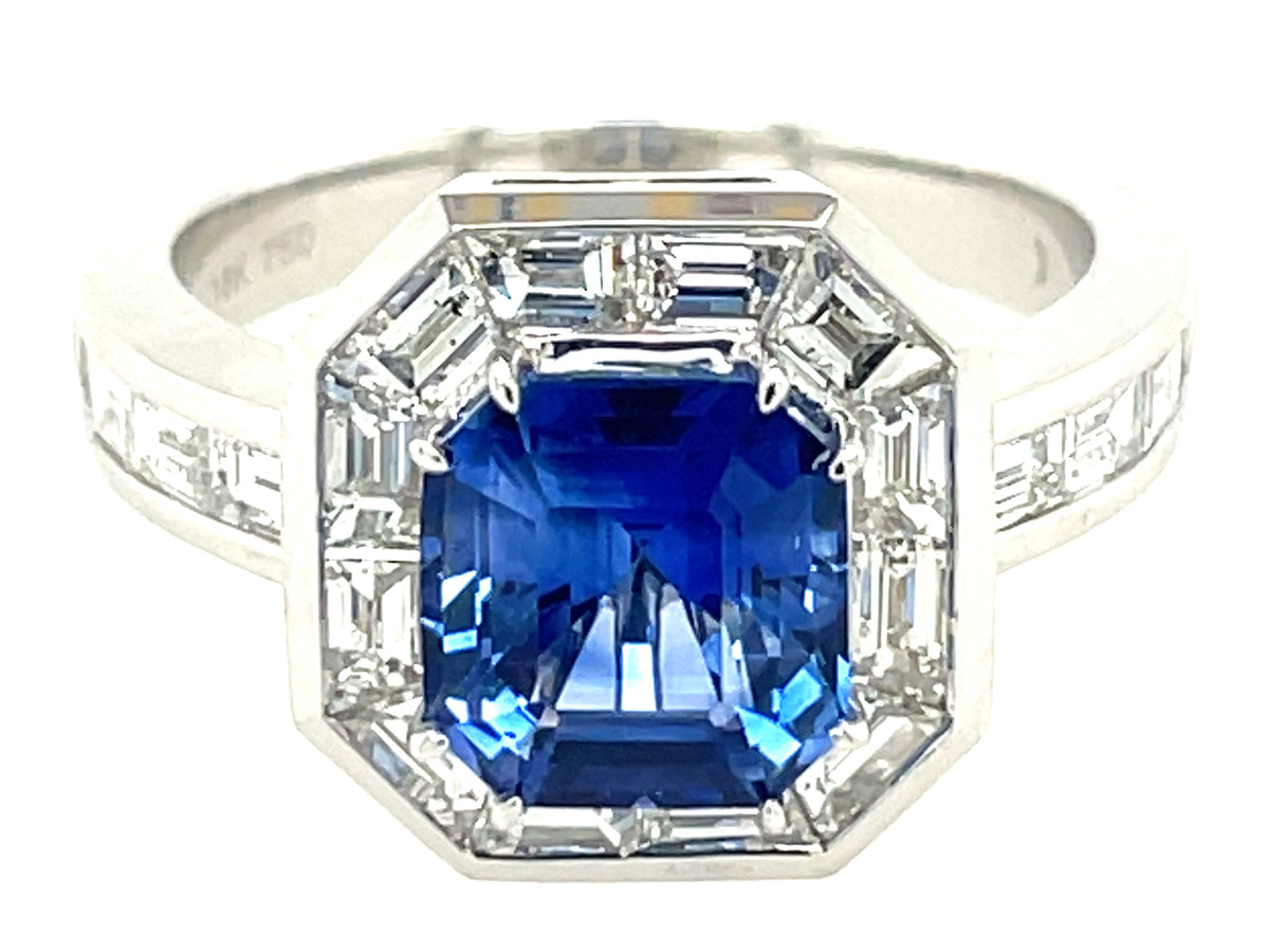 SAPPHIRE EMERALD CUT & DIAMOND BAGUETTE HALO & SHANK RING