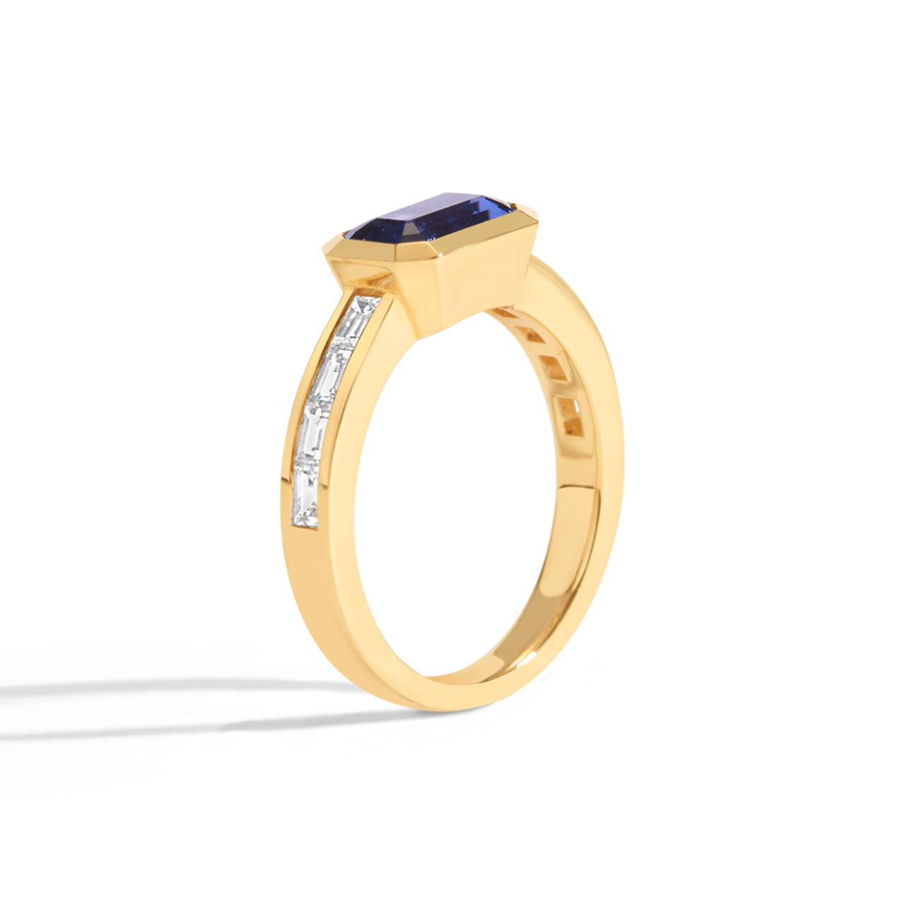 Emerald Cut Sapphire & Baguette Diamond Bezel Ring