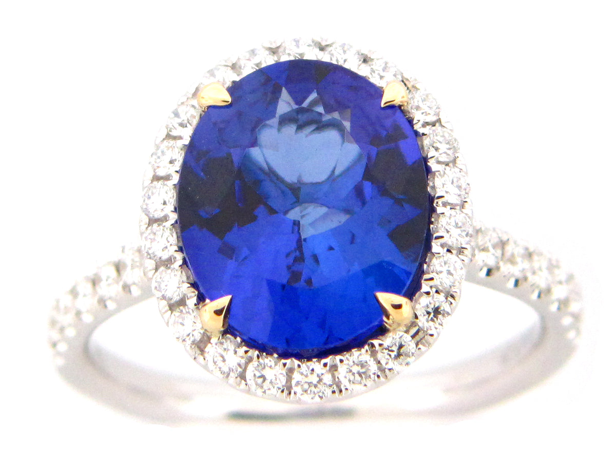 TANZANITE & DIAMOND RING, 18KWY (H)