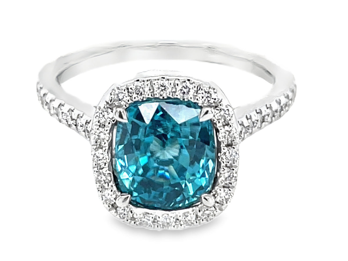 BLUE ZIRCON CUSHION & DIAMOND HALO RING