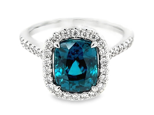 BLUE ZIRCON CUSHION & DIAMOND HALO RING