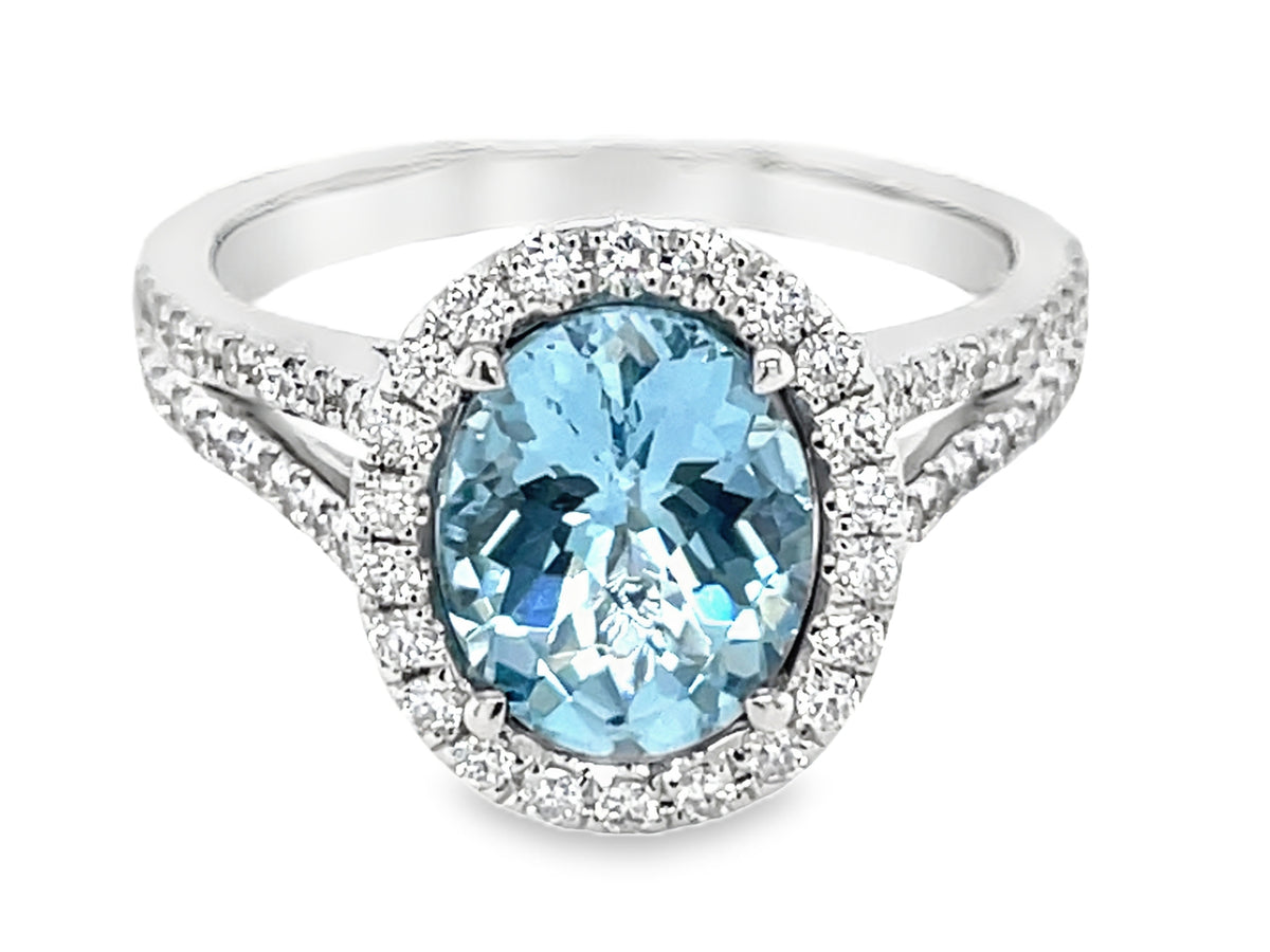 AQUAMARINE OVAL & DIAMOND HALO SPLIT SHANK RING