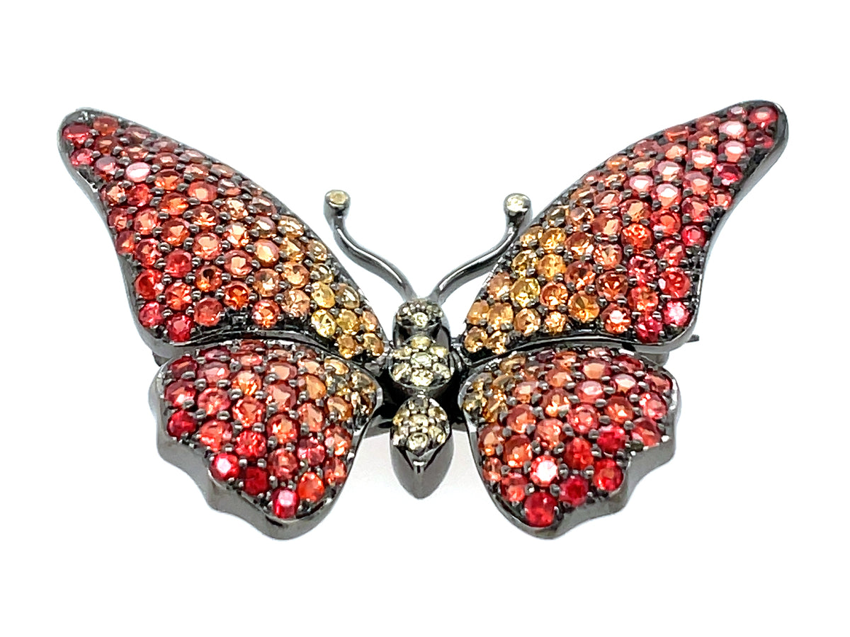 ORANGE SAPPHIRE BUTTERFLY BROOCH, BLACK FINISH, SILVER (H/U)